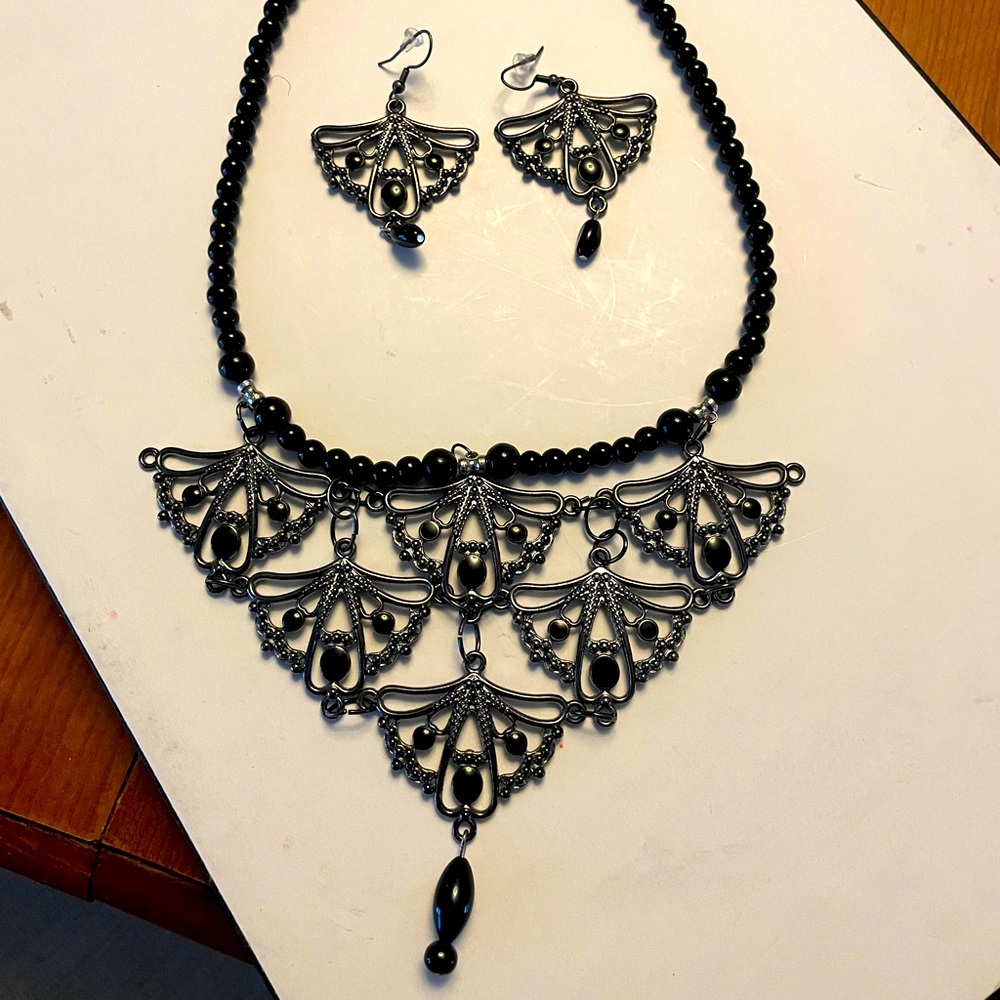 Unique handcrafted beaded necklace/earring set
